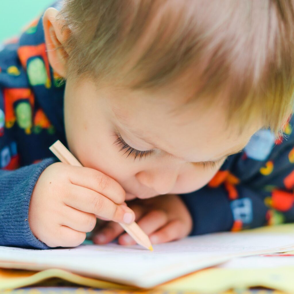 Young child writing