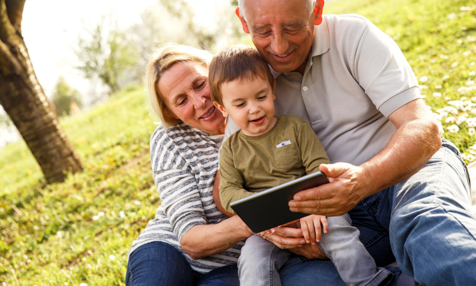 A stock image of a family reading a book