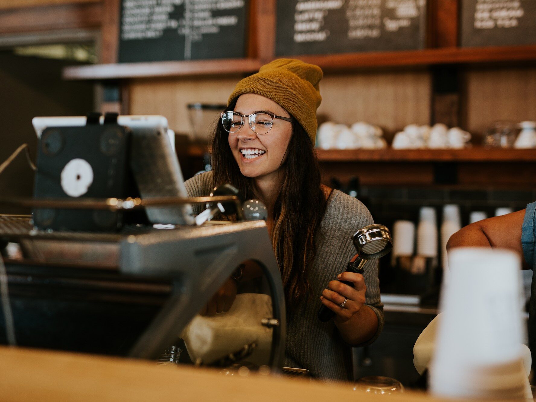 A barista preparing coffee